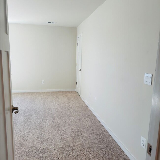 Building Photo - Brand New 4 Bed 3.5 Bath End Unit Townhome in Inwood