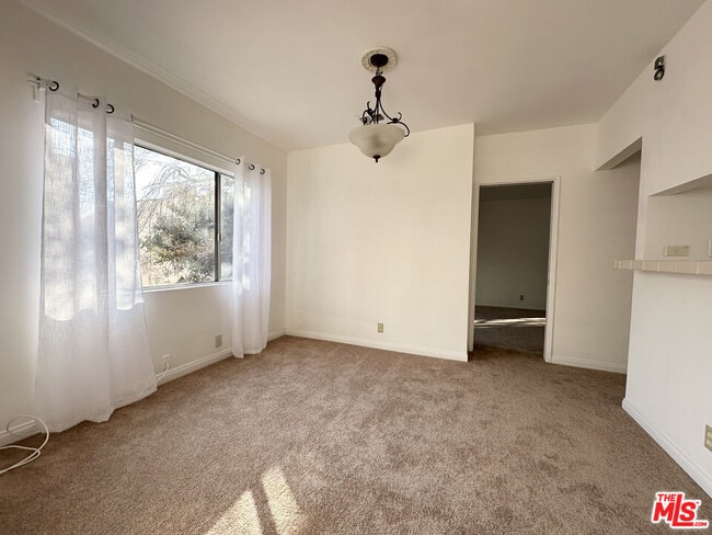 Building Photo - 6069 1/2 Cashio St