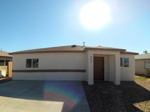 Building Photo - 9821 S Phoenix Dr