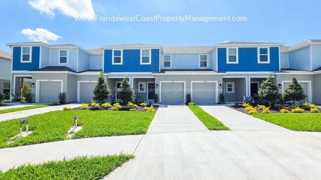 Building Photo - OUTSTANDING BRAND NEW TOWNHOME MOVE IN READY! AZARIO TOWNHOMES LWR !