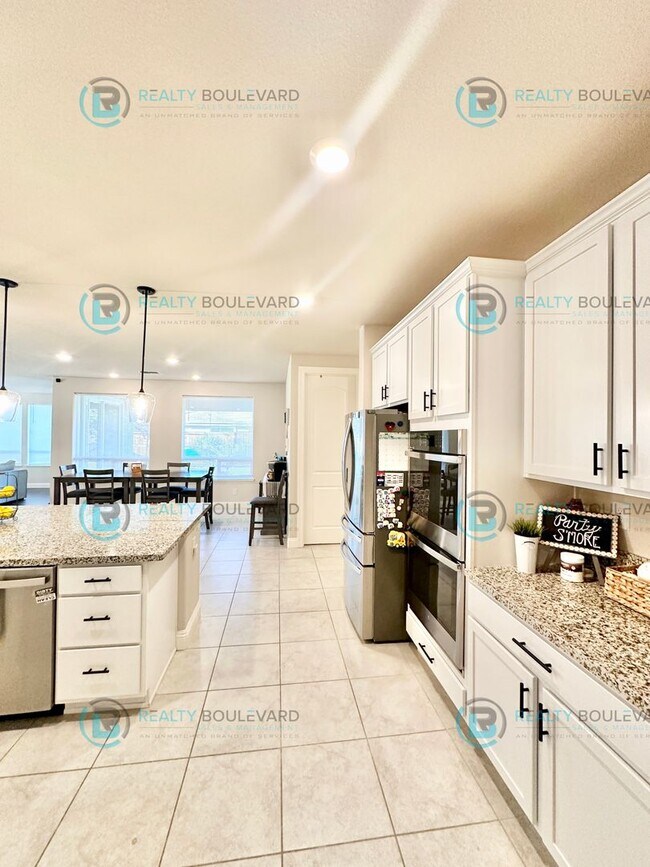 Building Photo - Welcome to your dream home, where modern elegance meets unparalleled convenience!