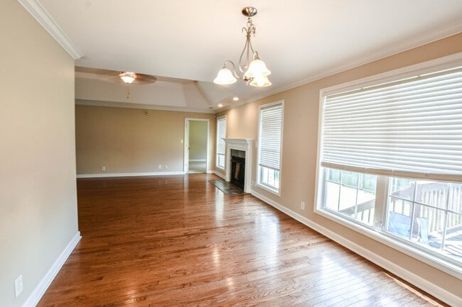 Building Photo - Pet Friendly Three Bedroom with Bonus!