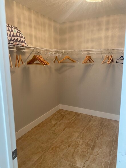 Walk-in master closet - 615 Big Spring Dr