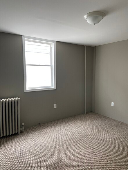 Bedroom new carpeting and windows - 946 Exeter Ave