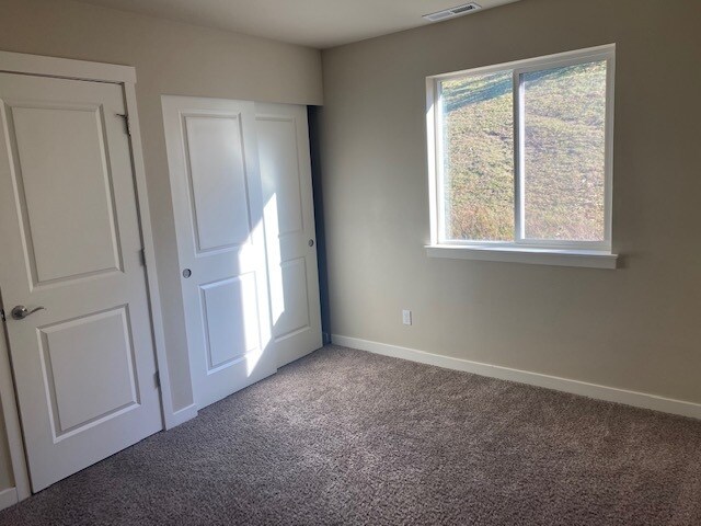 Building Photo - 702 Courage Ct