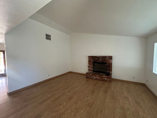 Building Photo - Your Dream Home: Spacious Interiors, Garage, and Huge Backyard