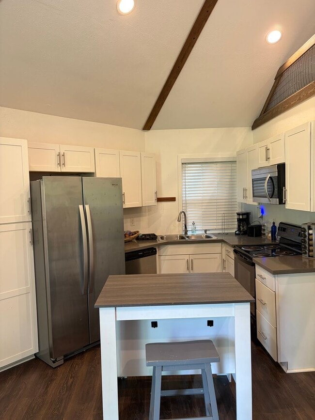 Building Photo - Charming "Tiny Home" Living – 1BR + Loft Carriage House