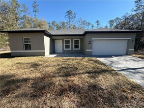 Building Photo - 8587 N Spikes Way