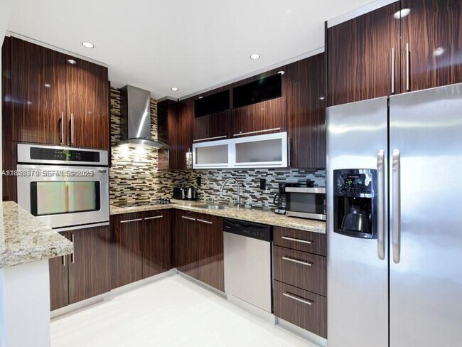 Building Photo - 19390 Collins Ave