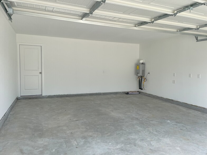 Sizeable 2 car garage - 25665 Rose Creek Dr
