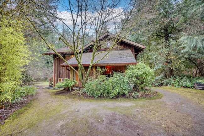 Building Photo - A unique home in the woods near Gazzam Lake