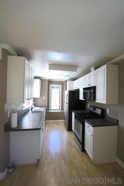 Building Photo - 10895 Camino Ruiz