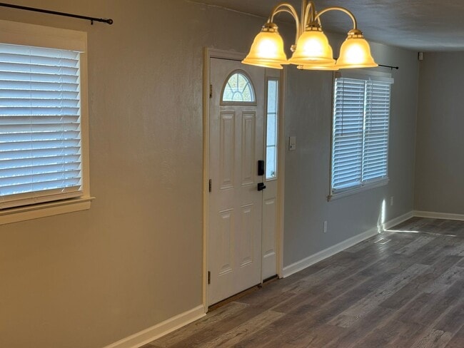 Building Photo - Beautiful updated home with new flooring and fresh paint