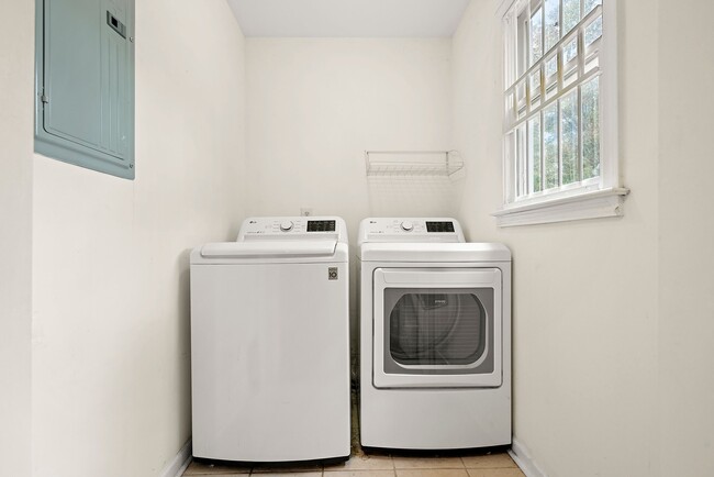 Convenient in-unit washer and dryer for added ease and comfort - 247 Farrington Ave SE