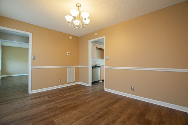 Building Photo - Pet Friendly Three Bedroom with Bonus!