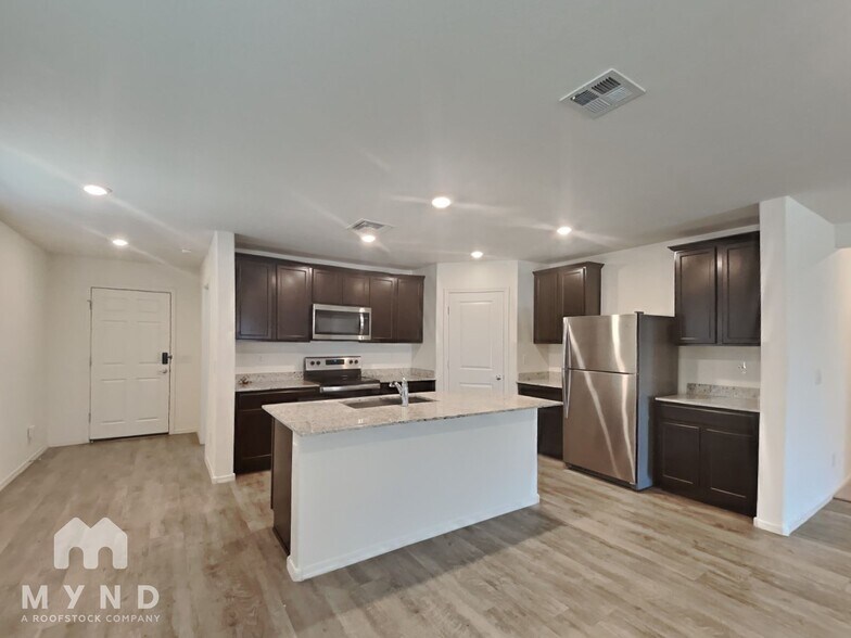 Building Photo - 1557 E Caballero Dr