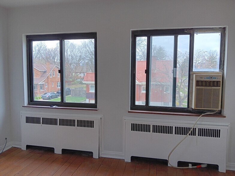 Front Living Room Widows-Newly painted heat registers & walls - 4525 Roth Ave