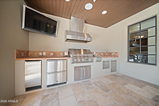 Building Photo - 9290 E Thompson Peak Pkwy