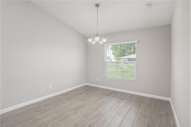 Building Photo - 1690 SW Morelia Ln