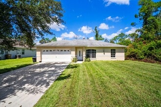 Building Photo - Beautiful 3 bedrooms+ DEN 2 bathrooms sing...