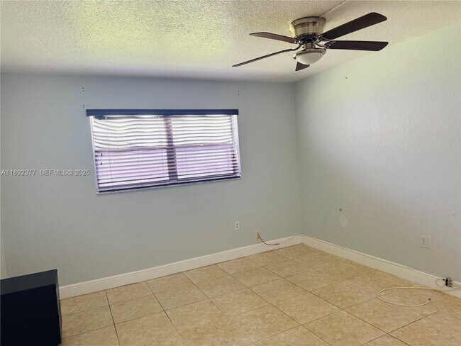 Building Photo - 8110 Sunrise Lakes Blvd