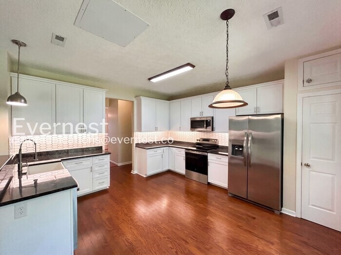 Building Photo - 6228 Weathersfield Way