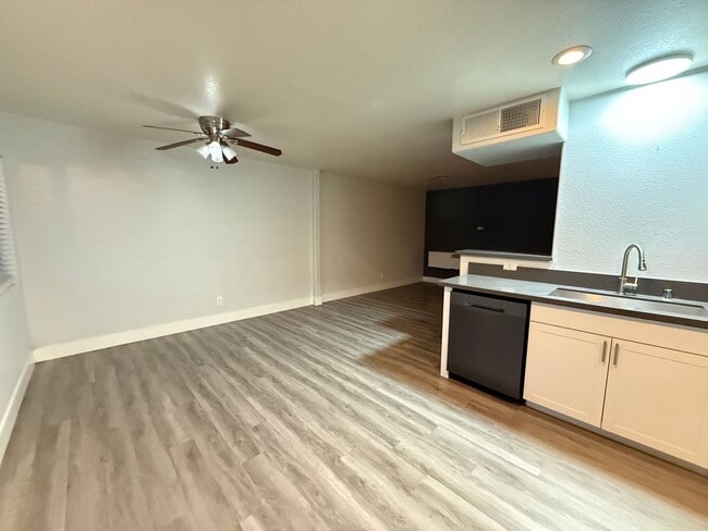 Building Photo - $500 OFF 1ST MONTHS RENT Updated 3-Bedroom Townhome in Gated Community with Pool Access