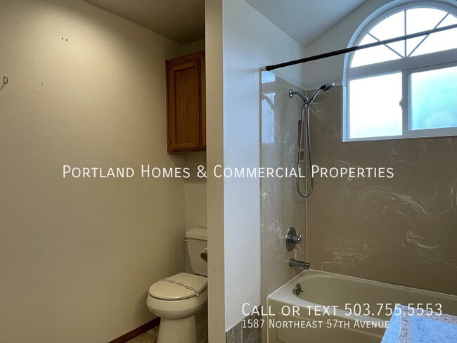 Building Photo - 1587 NE 57th Ave