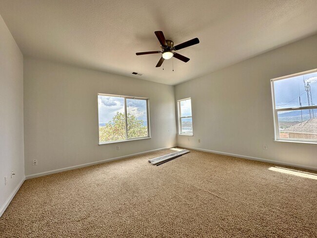Building Photo - 4 bedrooms, 2 1/2 Baths with a 3 Car Garag...