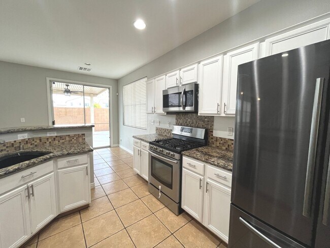 Building Photo - 1847 sq ft, 2 story, 4 Bedroom, 2 1/2 bath, 2 Car Garage home in the Vibrant city of Las Vegas.