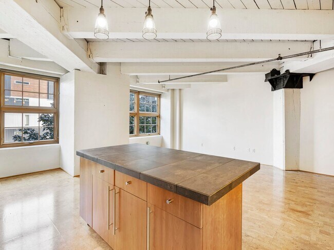 Building Photo - Marshall Wells - North facing Pearl District Loft w/parking/storage/ac