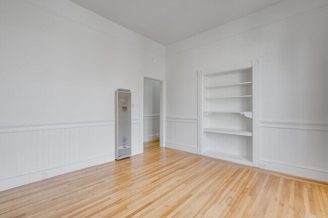 Building Photo - Remodeled pet friendly, top floor 2BR with in-unit laundry