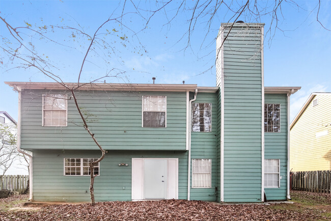 Building Photo - Home with Soaring Ceilings