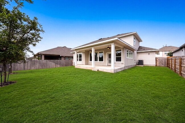 Building Photo - Greenbelt. 3 Car Garage. Built In Dog Room.