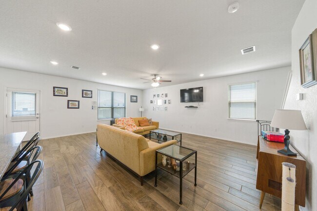 Building Photo - Stylish 4-Bedroom Home with Solar & Game R...