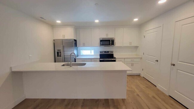 Building Photo - Brand New Regency on 9th Townhome