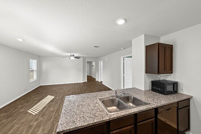 Building Photo - Welcome to Your Bright and Inviting Home