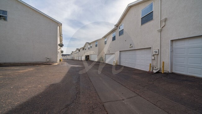 Building Photo - Spacious 3BR Townhome with 2-Car Garage & Private Covered Balcony