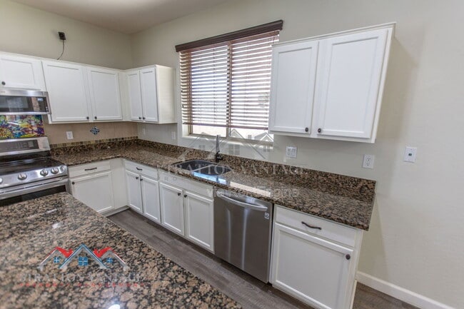 Building Photo - 14099 W Riviera Dr