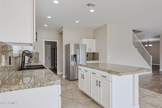 Building Photo - 15569 W Gelding Dr