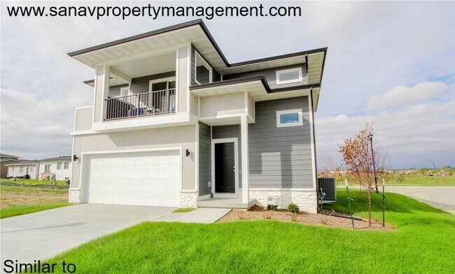 Primary Photo - Stunning 4-Bedroom Home with Finished Base...