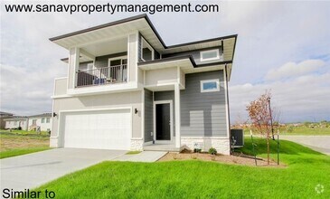 Building Photo - Stunning 4-Bedroom Home with Finished Base...