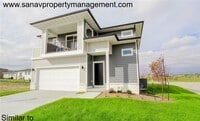 Building Photo - Stunning 4-Bedroom Home with Finished Base...