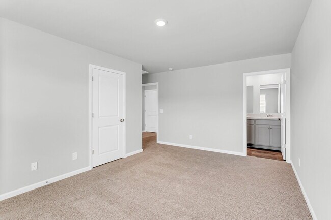 Building Photo - Beautiful Townhome at the Pines of New Hampstead