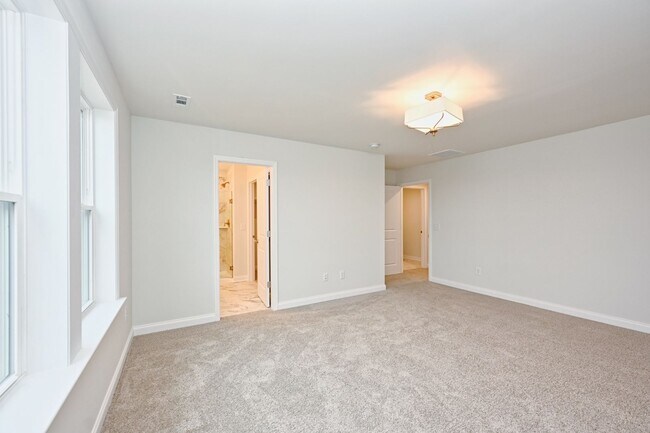 Building Photo - **BE THE LUCKY ONE TO LIVE IN THIS 2024-BUILT TOWNHOME**