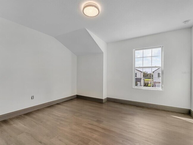 Building Photo - 7323 Pool Compass Loop