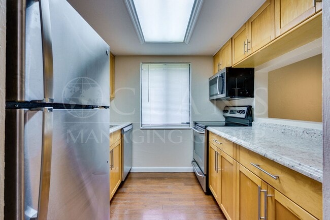 Building Photo - WATERFRONT TRAILS TOWNHOME