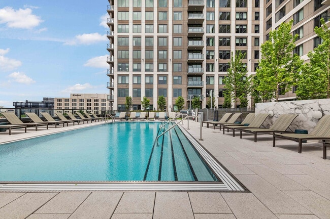 Elevate your everyday with resort-style rooftop relaxation. - One Oak Brook Commons