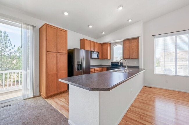 Building Photo - Bright & Spacious 4BR Tri-Level Home w/ Backyard + 2-Car Garage | Pool Access Included!