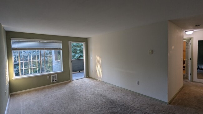 Living room with door to balcony - 15433 Country Club Dr